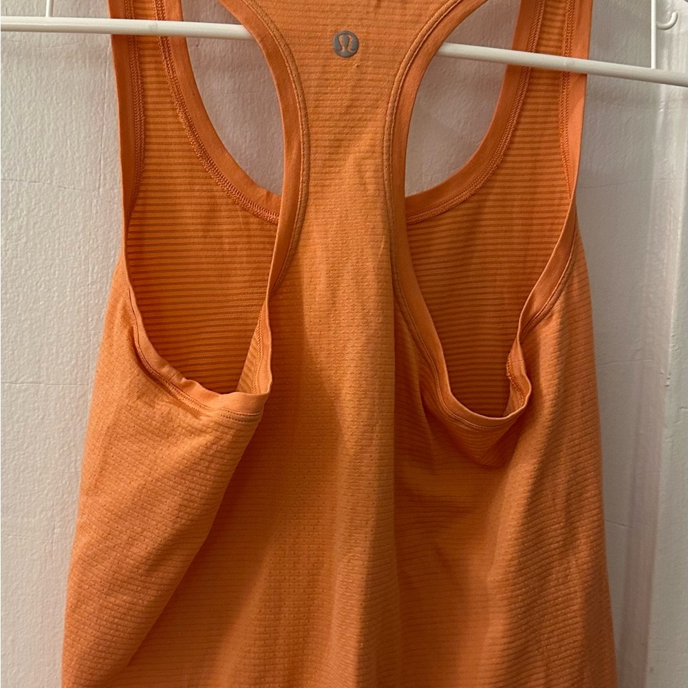 Lululemon orange swiftly racerback tank top size 4